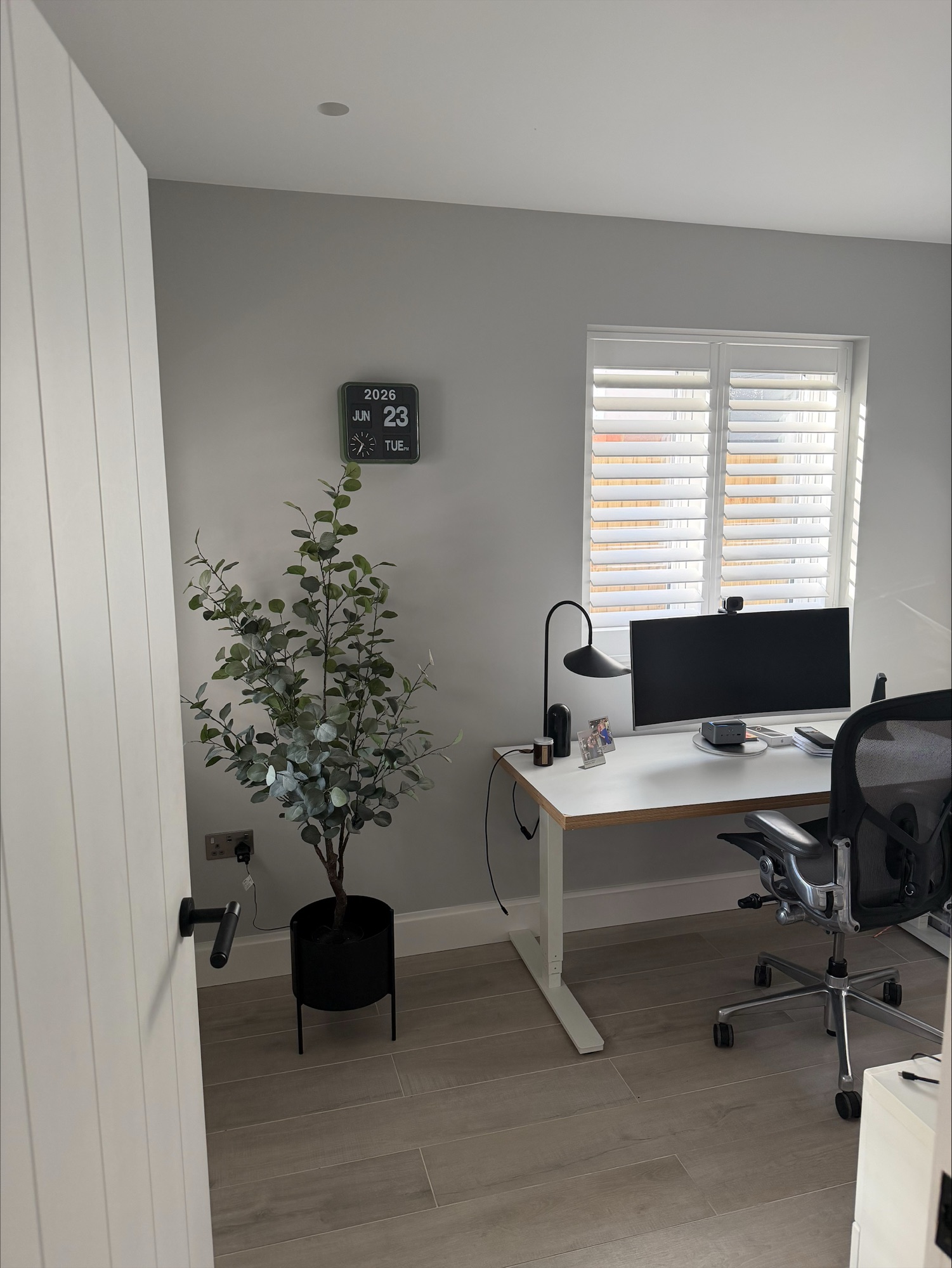 Refurbished home office with plantation shutters